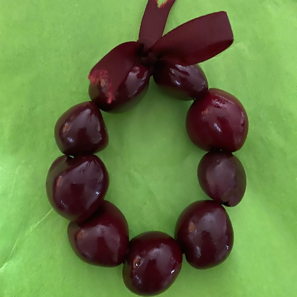 Red beaded bracelet.